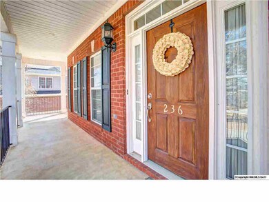 Wrap around front porch has room to enjoy the view.