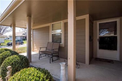 504 S Poseidon Way, Raymore, MO 64083 - photo 2