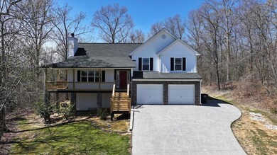 Tri-level home with stairway, an attached garage, 