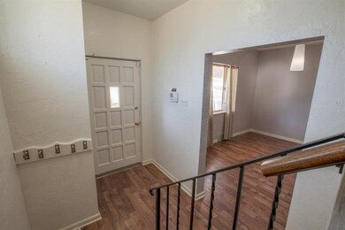 Entrance way to brand new flooring and freshly pai