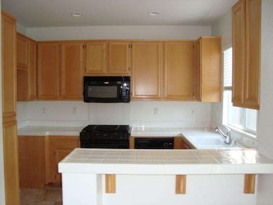 KITCHEN FROM DINING ROOM