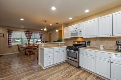 Kitchen with newer cabinets and appliances.