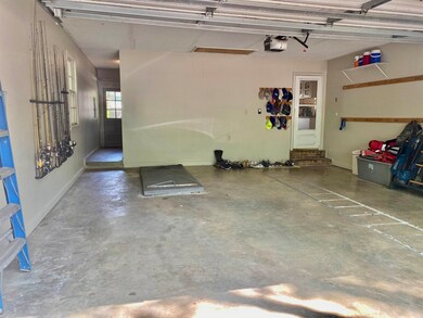 Double garage with exterior access and storage, al