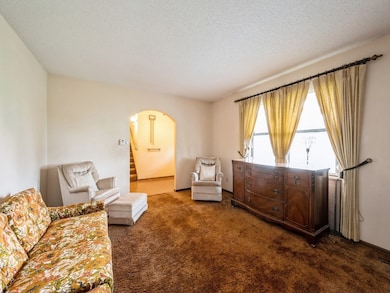 Great room off arched foyer entrance