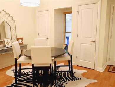 DINING AREA WITH 2 PANTRIES ON EITHER SIDE OF THE