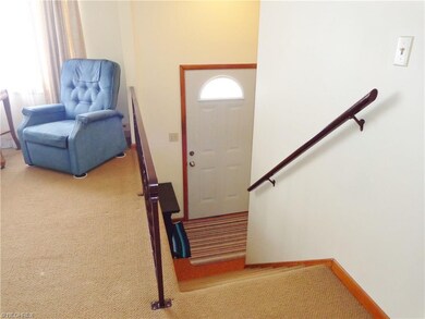 From the entry, come up into the living room or go