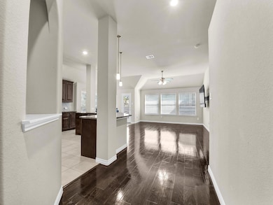 Hall featuring light wood-type flooring