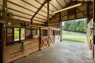 4 stalls with tack room