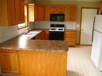 2601 Meadow Ridge, Byron Center, MI 49315 - photo 4