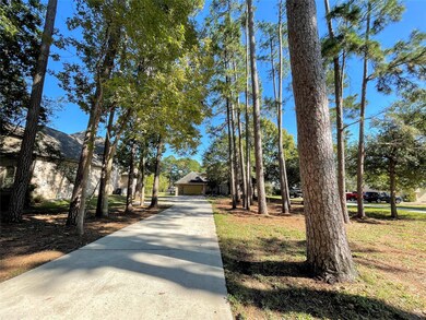 Entire front yard boasts gorgeous mature trees.