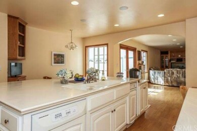 Kitchen opens to Family room