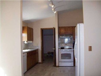 Kitchen leading to main floor laundry