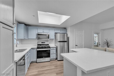 Kitchen featuring appliances with stainless steel