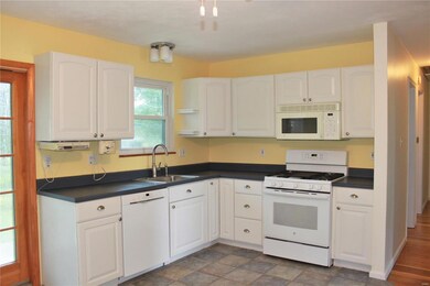 Newer cabinets, sink, counter-tops, dishwasher and