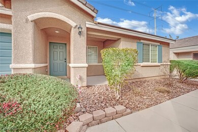 Property entrance with stucco siding