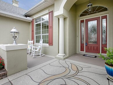 A CUSTOM PAINTED WALKWAY LEADS TO THE PORCH, COVER