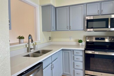 The kitchen with new oven , microwave and dishwash