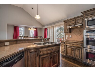 Work space allows easy access to Bar, Dining Room 