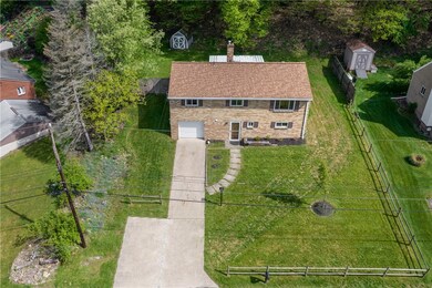 The home sits on a nice lot with a treed rear yard
