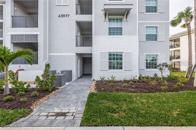 View of property featuring central air condition u