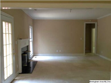 Family room with doorway to powder room & Master b