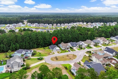Aerial view of residential area with a forest