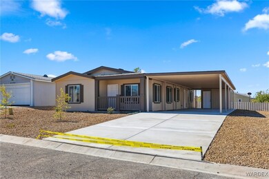 View of front of property featuring a garage and a