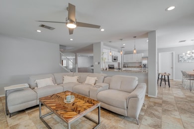 Living room featuring recessed lighting, ceiling 
