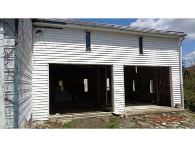 Parking Lot/Garage. additional 2 bay garage