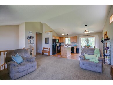 View from the living room into the kitchen and din
