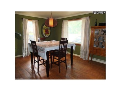 Living room or dining room with hardwood floors!