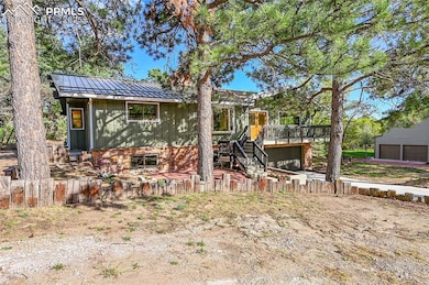 View of front of house featuring stairway, board a