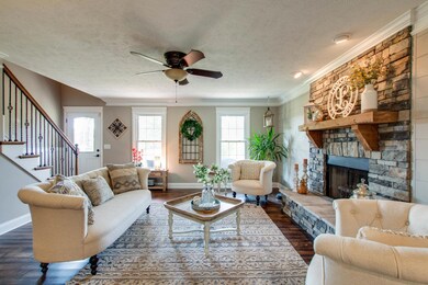 Notice the crown molding (which extends throughout the house!) and headers added above each window...
