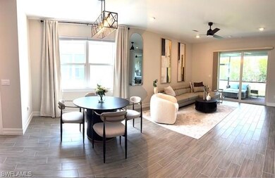Dining room featuring ceiling fan and tile floors