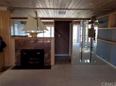Lower unit living room with fireplace