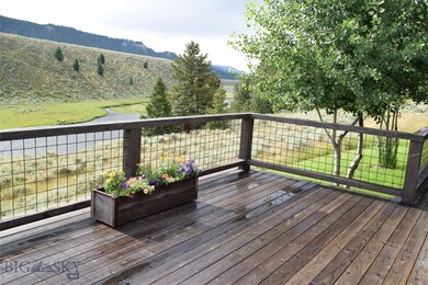 NW corner of deck looking down river and across to