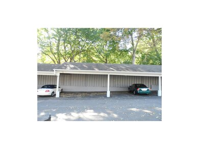 Carport is just a few steps from building.