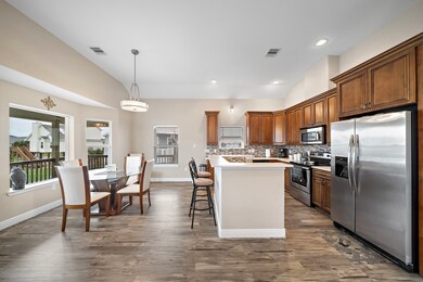 Kitchen with stainless appliances and island