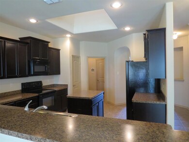 Lots of Cabinets and Counter Space in the Kitchen