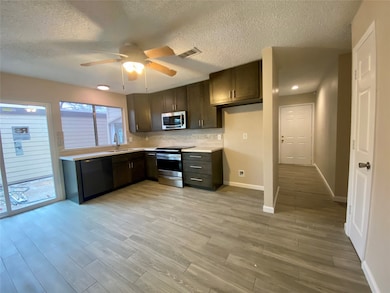 Beautiful kitchen with quartz countertop, stainles