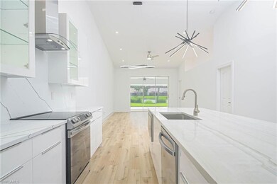 Kitchen with a sink, appliances with stainless ste