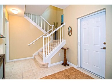 Welcoming Entry - Wide stairway to second floor Lo