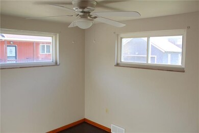 LIGHT AND BRIGHT MASTER BEDROOM.  NOTE LAMINATE FL