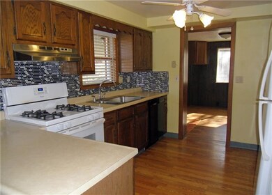 New laminate floor in dining room, kitchen and fam