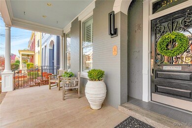 Covered front porch has beadboard ceiling.