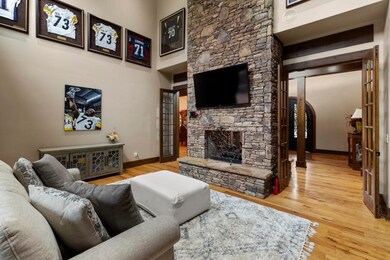 Den with dual sided fireplace