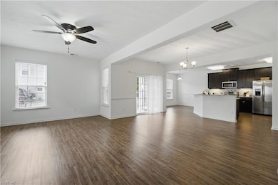 Warm colored laminate flooring downstairs at 2171 Humphreys Drive