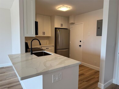 goegeous kitchen with quartz counters