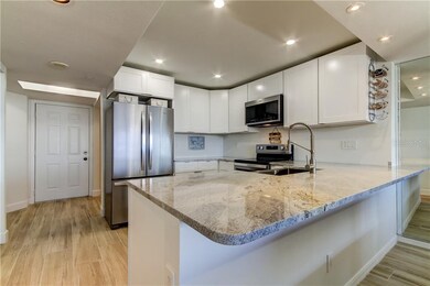 Beautifully updated kitchen with views of the beac