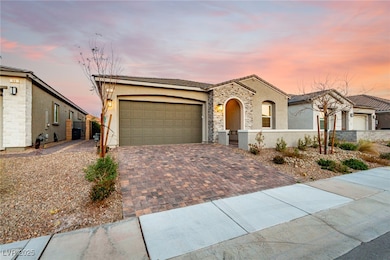 View of front of home featuring stucco siding, dec